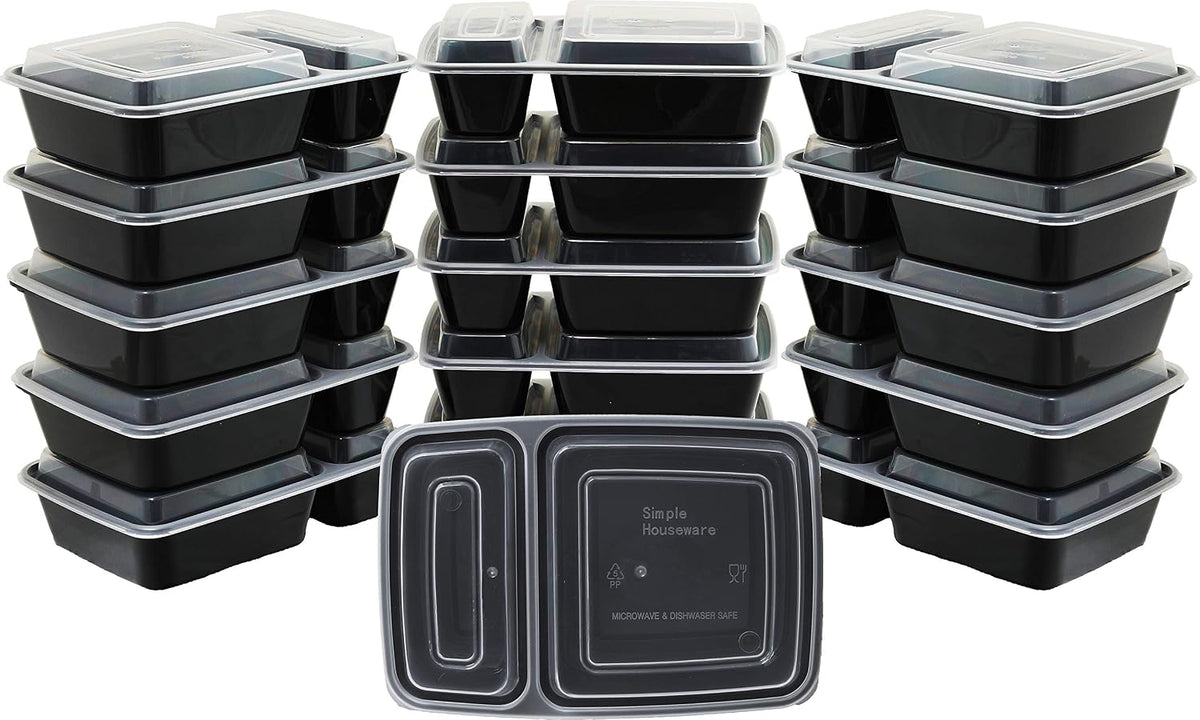 Multiple black meal prep containers with clear lids on a white background