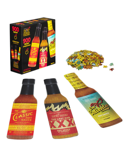 Hot sauce bottles, packaging, and puzzle on a white background